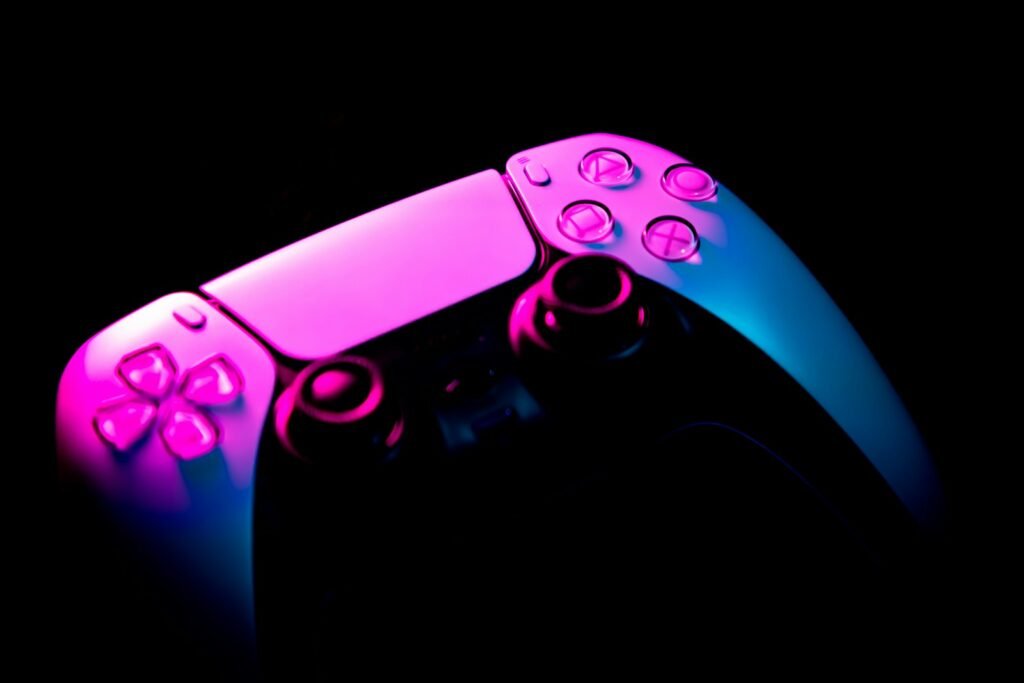 Gaming controller in a cinematic setup for the most anticipated games of 2026