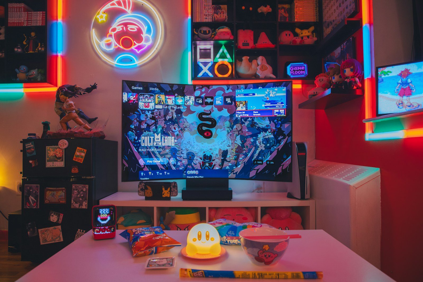 Gaming room with television and neon lights