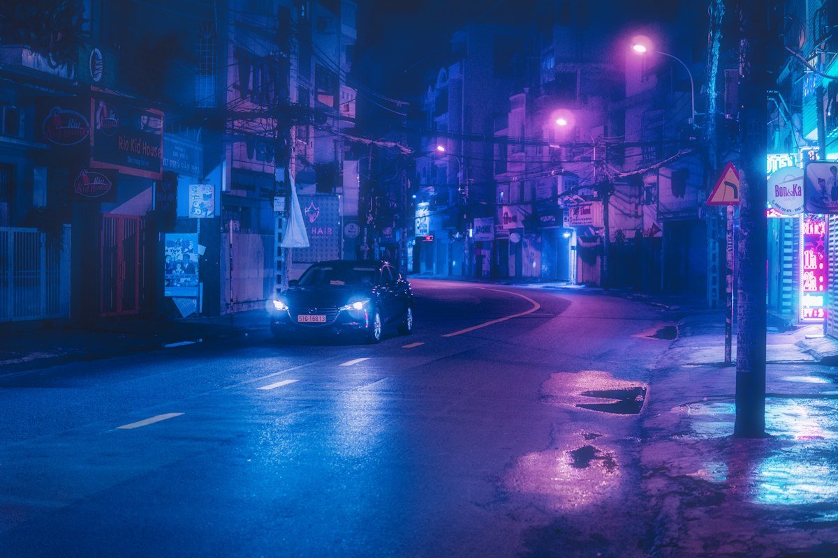 Illustrative neon city scene; not official Nivalis Nights game artwork